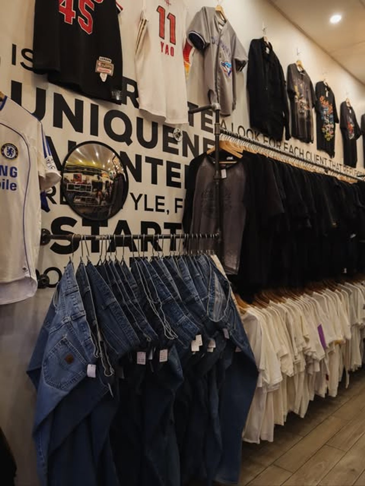 Vintage denim racks and shop interior at No spot. Vintage, Kensington Market Toronto